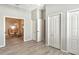 Spacious hallway with access to multiple rooms and great natural light at 7160 Rue De Palisades # 4, Sarasota, FL 34238