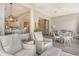 Open living space with adjacent kitchen and breakfast nook at 7160 Rue De Palisades # 4, Sarasota, FL 34238