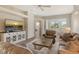 Spacious living room with comfortable seating and large windows at 7160 Rue De Palisades # 4, Sarasota, FL 34238