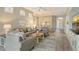 Bright living room featuring a neutral color palette and plenty of natural light at 7160 Rue De Palisades # 4, Sarasota, FL 34238