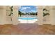 Inviting pool area with comfortable lounge chairs at 7160 Rue De Palisades # 4, Sarasota, FL 34238