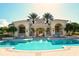 Inviting resort-style pool with comfortable seating at 7160 Rue De Palisades # 4, Sarasota, FL 34238