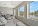 Relaxing sunroom overlooking a serene lake at 7160 Rue De Palisades # 4, Sarasota, FL 34238
