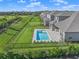 Aerial view of homes with private pools at 9511 Tequila Sunrise Dr, Sarasota, FL 34241