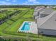 Aerial view of house and backyard pool at 9511 Tequila Sunrise Dr, Sarasota, FL 34241