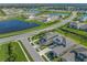 Aerial view of a house and surrounding community at 9511 Tequila Sunrise Dr, Sarasota, FL 34241