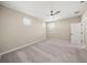 Spacious bedroom with carpeted floor and ceiling fan at 9511 Tequila Sunrise Dr, Sarasota, FL 34241