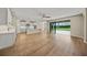 Open Gathering room with pool view and sliding glass doors at 9511 Tequila Sunrise Dr, Sarasota, FL 34241