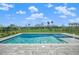Relaxing rectangular pool with spa and water feature at 9511 Tequila Sunrise Dr, Sarasota, FL 34241
