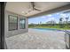 Relaxing pool area with patio, built-in grill, and pool at 9511 Tequila Sunrise Dr, Sarasota, FL 34241