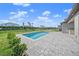 Home with a refreshing pool, spacious patio, and lush landscaping at 9511 Tequila Sunrise Dr, Sarasota, FL 34241