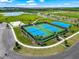 Community tennis and pickleball courts at 9511 Tequila Sunrise Dr, Sarasota, FL 34241