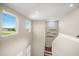 View from upstairs showing open staircase and distant view at 9511 Tequila Sunrise Dr, Sarasota, FL 34241