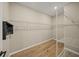 Large walk-in closet with wire shelving and hanging rods at 9511 Tequila Sunrise Dr, Sarasota, FL 34241