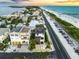 Aerial view showcasing home's oceanfront location and neighborhood at 101 7Th S St, Bradenton Beach, FL 34217