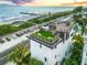 Stunning aerial view of home with rooftop deck and oceanfront location at 101 7Th S St, Bradenton Beach, FL 34217