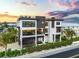 Modern coastal home featuring a rooftop deck and pool at 101 7Th S St, Bradenton Beach, FL 34217