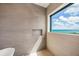 Shower with ocean view and modern tile at 101 7Th S St, Bradenton Beach, FL 34217