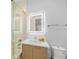 Contemporary bathroom with walk-in shower and updated vanity at 101 7Th S St, Bradenton Beach, FL 34217