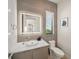 Modern powder room with vessel sink and unique wall tile at 101 7Th S St, Bradenton Beach, FL 34217