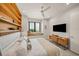 Bright bedroom with large window, comfy bed, and modern TV at 101 7Th S St, Bradenton Beach, FL 34217