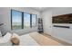 Bedroom with ocean view, comfy bed, and modern decor at 101 7Th S St, Bradenton Beach, FL 34217