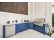 Modern outdoor kitchen with grill and beverage fridge at 101 7Th S St, Bradenton Beach, FL 34217