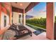 Relaxing lounge area near the pool with sunset views at 101 7Th S St, Bradenton Beach, FL 34217