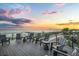 Ocean view rooftop deck with sunset views and seating at 101 7Th S St, Bradenton Beach, FL 34217