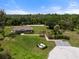 Aerial view of community space including pavilion and river at 1021 Fernleaf Run, Bradenton, FL 34212