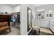 Elegant bathroom with large mirror and double vanity at 1021 Fernleaf Run, Bradenton, FL 34212
