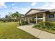 Community pavilion with covered seating and landscaping at 1021 Fernleaf Run, Bradenton, FL 34212