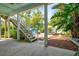 Private backyard with patio, fire pit and lush landscaping at 1110 12Th W St, Bradenton, FL 34205