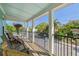 Relaxing balcony overlooking a tree-lined street at 1110 12Th W St, Bradenton, FL 34205