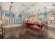Bright gallery showcasing artwork, with hardwood floors and track lighting at 1110 12Th W St, Bradenton, FL 34205