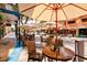 Outdoor seating at sidewalk cafe in a vibrant downtown area at 1110 12Th W St, Bradenton, FL 34205