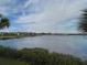 Serene water view from screened porch at 1139 Riverscape St # 2D, Bradenton, FL 34208