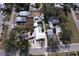 Aerial view showing home's large backyard, pool, and location in a residential neighborhood at 1213 5Th W St, Palmetto, FL 34221