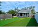 Large backyard with putting green and artificial turf at 1213 5Th W St, Palmetto, FL 34221
