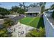 Backyard oasis with firepit and putting green at 1213 5Th W St, Palmetto, FL 34221