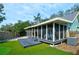 Screened porch, deck, putting green and artificial turf at 1213 5Th W St, Palmetto, FL 34221
