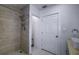 Updated bathroom with walk-in shower and tile surround at 1213 5Th W St, Palmetto, FL 34221
