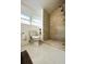 Modern bathroom with a walk-in shower and tile flooring at 1213 5Th W St, Palmetto, FL 34221