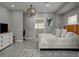 Second bedroom with a king-size bed and dresser at 1213 5Th W St, Palmetto, FL 34221