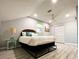 Relaxing bedroom with a queen-size bed and stylish decor at 1213 5Th W St, Palmetto, FL 34221