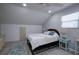 Spacious bedroom with a queen bed and light grey walls at 1213 5Th W St, Palmetto, FL 34221
