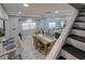 Bright dining area with a wooden table and chairs, adjacent to the kitchen at 1213 5Th W St, Palmetto, FL 34221