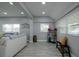 Open living room with light walls and wood-look floors at 1213 5Th W St, Palmetto, FL 34221