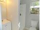 Bathroom with white vanity, shower, and toilet at 1323 36Th W St, Bradenton, FL 34205