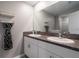 Double vanity bathroom with granite countertop at 14350 Easy Goer St, Ruskin, FL 33573